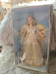 1999 Angel Barbie #24984 With Bird New. Price: $16.49.