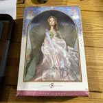 Golden Angel Barbie Doll 2006 New. Price: $69.99.