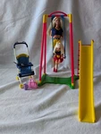 Vintage 1998 Barbie Giggles Swing & Kelly 2002 Happy Family Stroller Used. Price: $30.00.