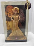 Mattel Marilyn Monroe Barbie Doll New. Price: $170.00.