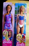 2 Barbie Dolls - Olympia Swimsuit And Teresa In Purple Dress Nip New. Price: $16.25.