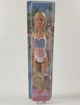 Barbie Doll, Blonde, In Swimsuit With Us Flag New. Price: $12.00.