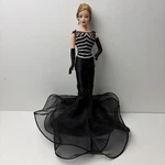 1999 Mattel Barbie Doll 40TH Anniversary Black Gown 21384 Used. Price: $16.99.