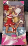 1996 Nebraska Cornhuskers University Cheerleader Barbie Mattel #17193 Vintage New. Price: $11.00.