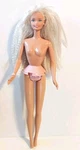 Vintage 1997 Mattel Twirlin' Make-up Barbie 18421 Nude Doll Earrings & Bracelet Used. Price: $10.99.