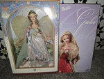 J9187 Golden Angels & B2722 Glamorous Gala Nib Barbies New. Price: $125.00.