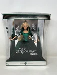 Holiday 2004 Barbie - Green Velvet Dress New. Price: $32.75.